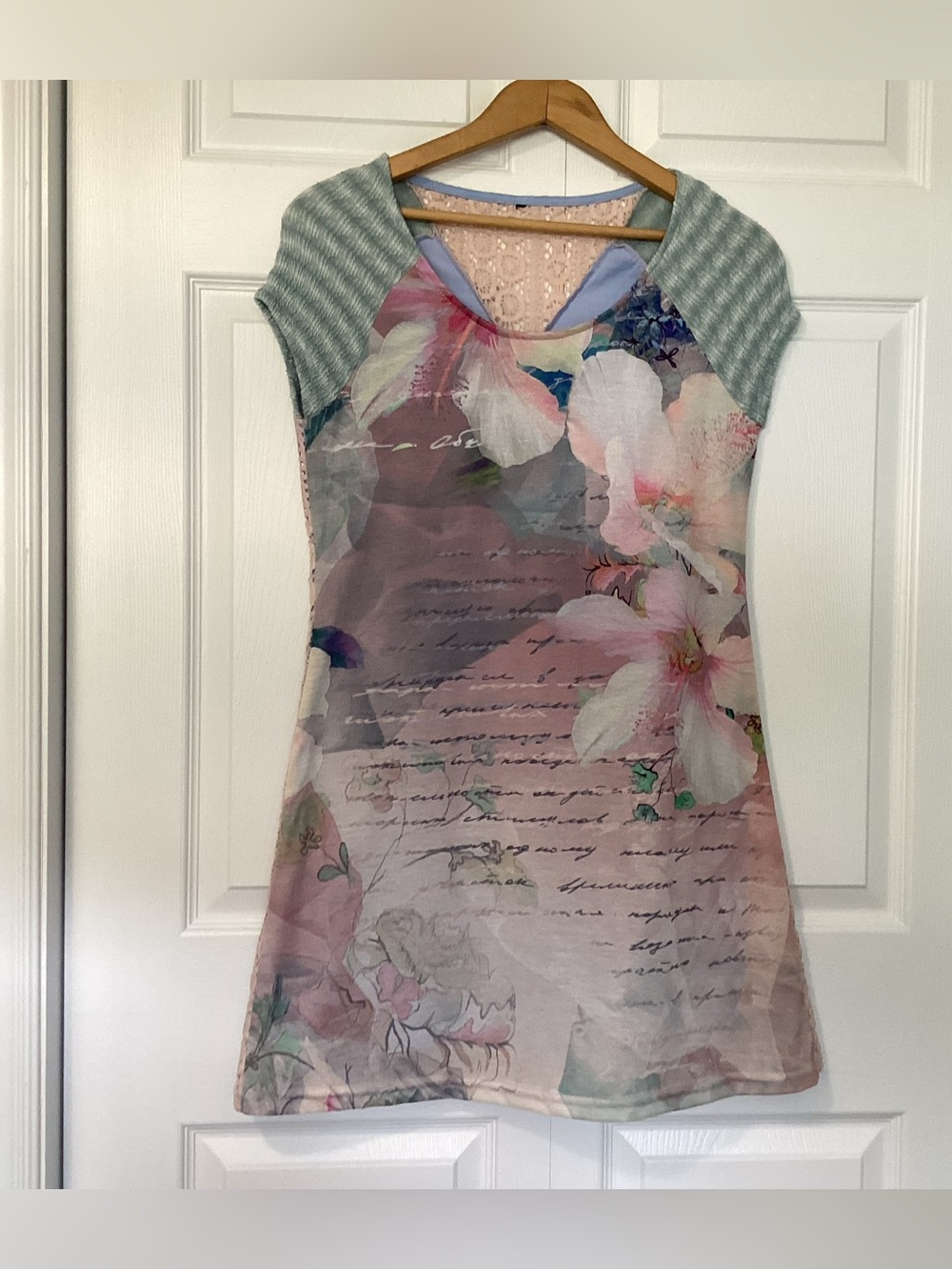 Unique women’s short floral dress with a lace back.